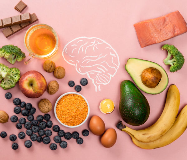 Best foods for brain and memory on pink background. Food for mind and charge of energy. Healthy lifestyle. Copy space. Top view